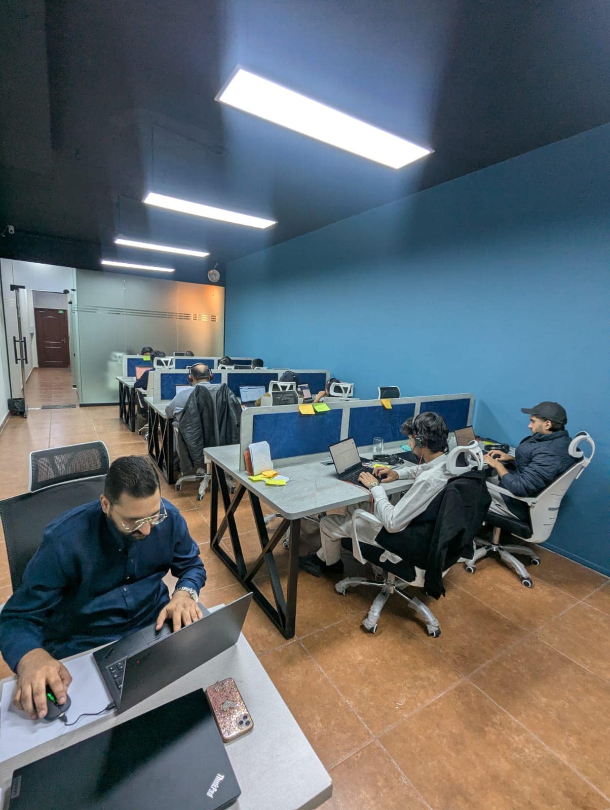 Account teams working together at their desks