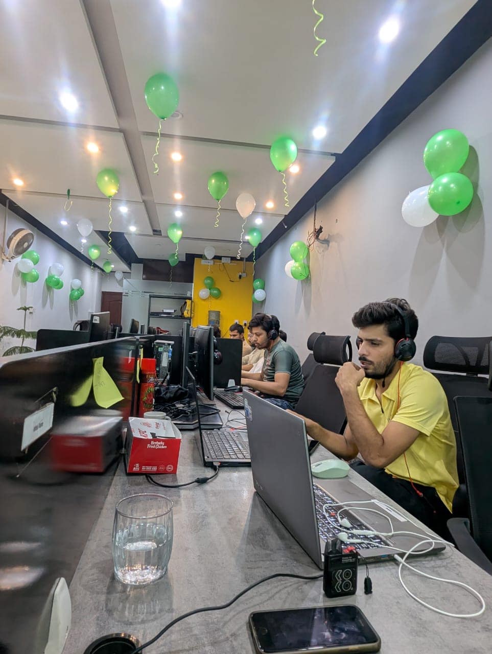 An agent staying focused on client work during the celebration