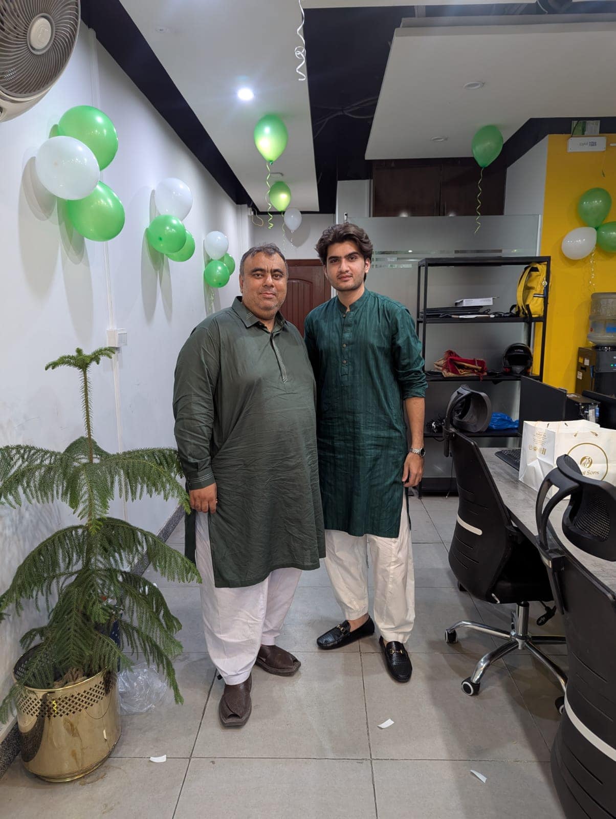 Company leadership posing together during Independence Day celebrations