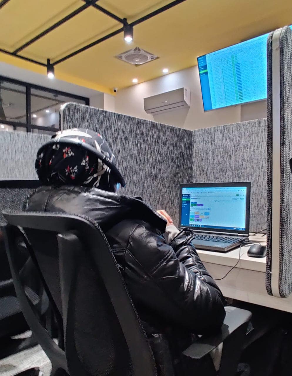 Three customer support agents wearing headsets